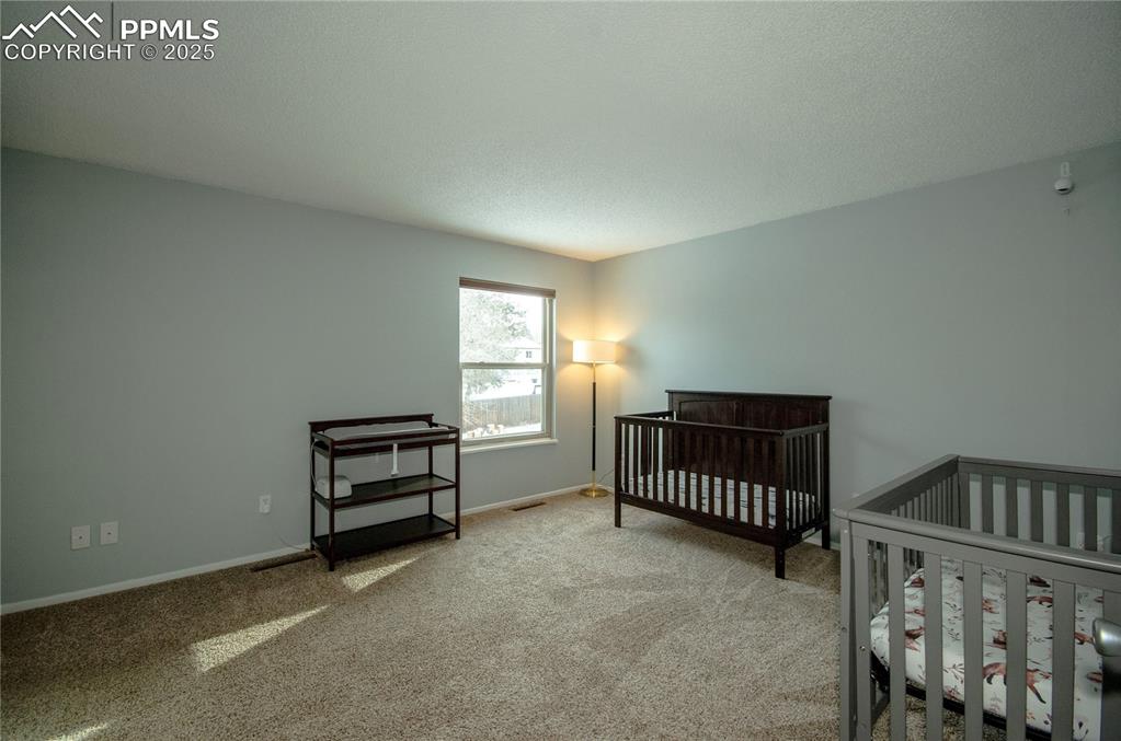 Image 12 of 23: Primary Bedroom