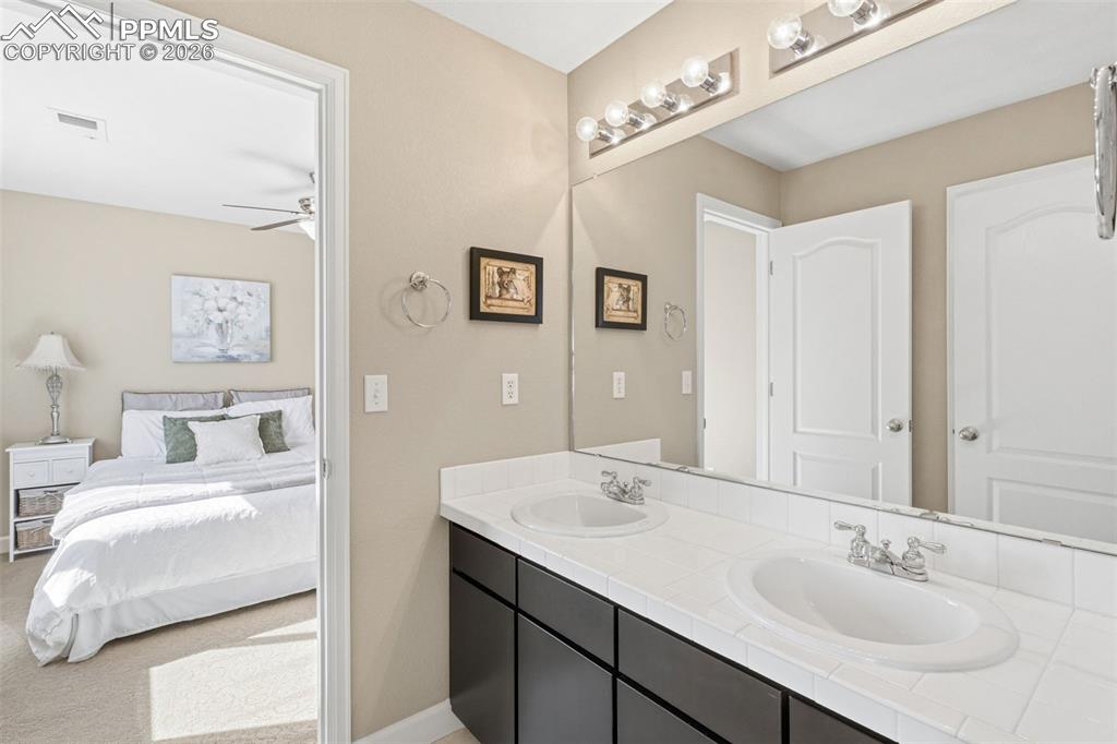 Image 23 of 32: Jack and Jill bathroom