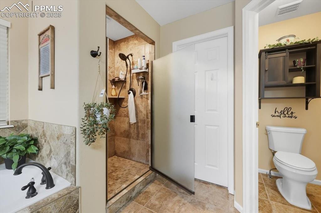 Image 23 of 41: Master Bathroom