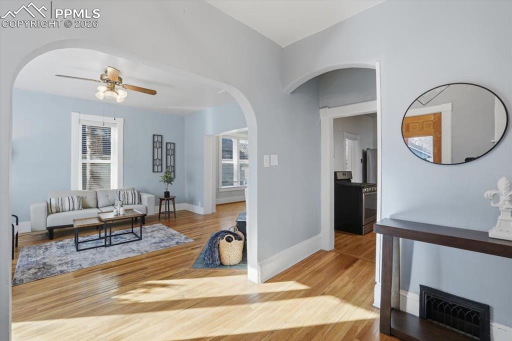 Image 5 of 48: Entry looking into the living room