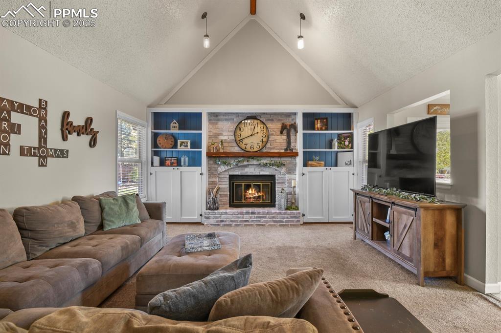 Image 20 of 50: Cozy Gas Fireplace! Beamed ceiling!