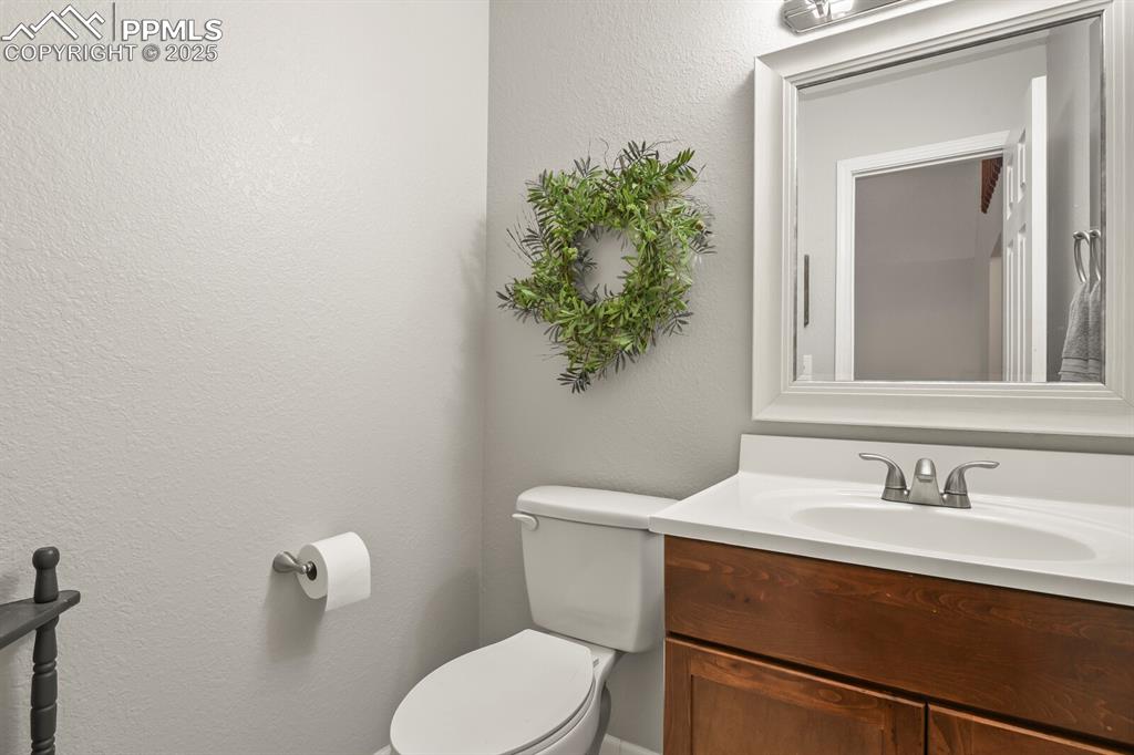 Image 24 of 50: Powder bath on main level