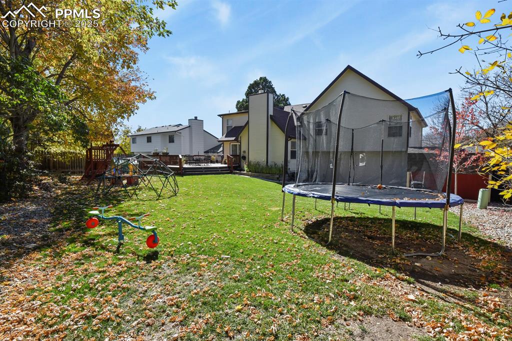 Image 46 of 50: Large, level backyard!