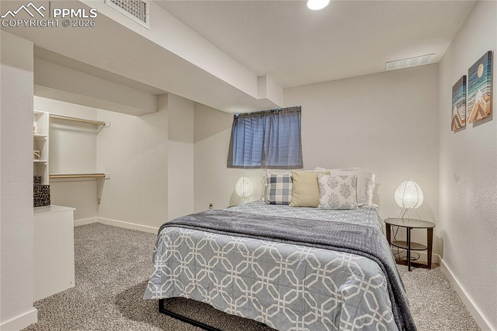 Image 21 of 38: Bedroom