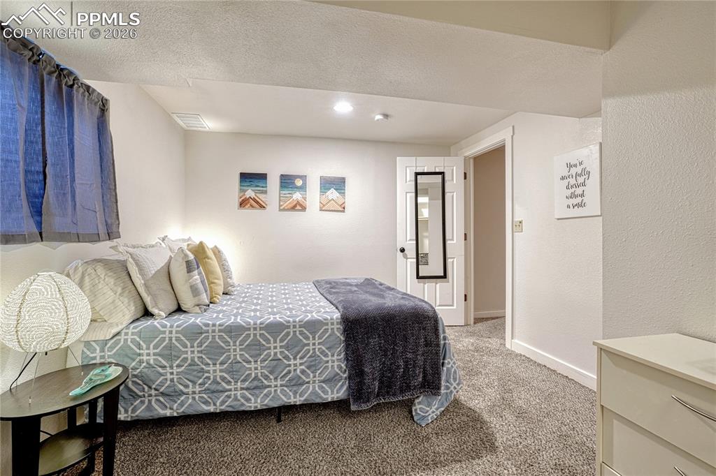 Image 22 of 38: Bedroom