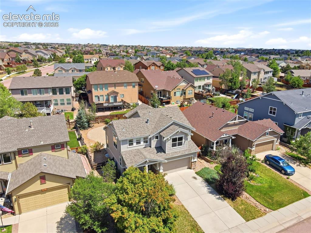 Image 41 of 47: Residential neighborhood featuring varied architectural styles and mature l