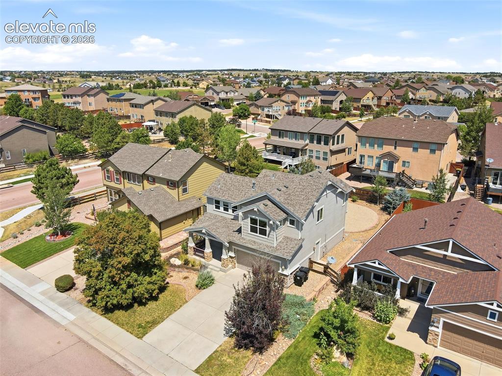 Image 42 of 47: Residential community with diverse architectural styles, featuring varying