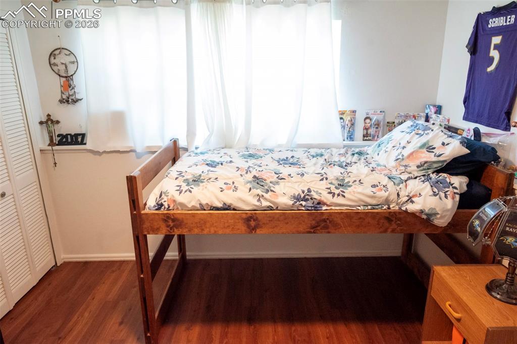 Image 18 of 24: Basement bedroom