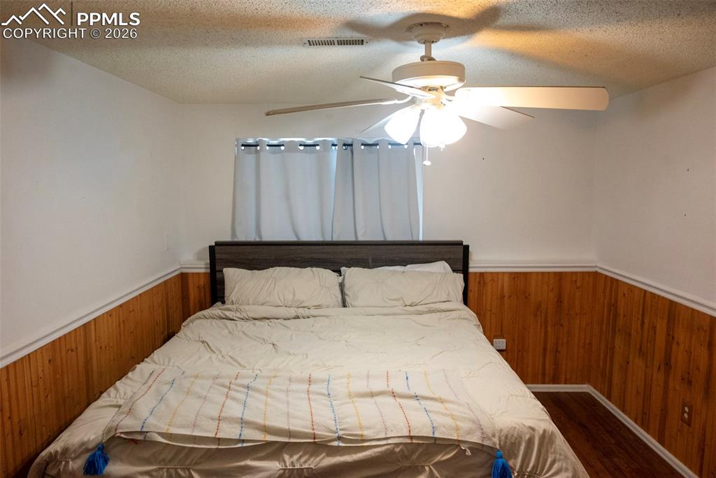 Image 19 of 24: Basement bedroom