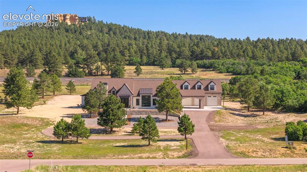 Image 1 of 49: Expansive 5 acre lot showcasing this fully custom home