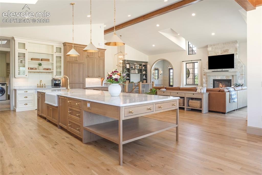 Image 10 of 49: Secondary kitchen view highlighting generous workspace and open layout.