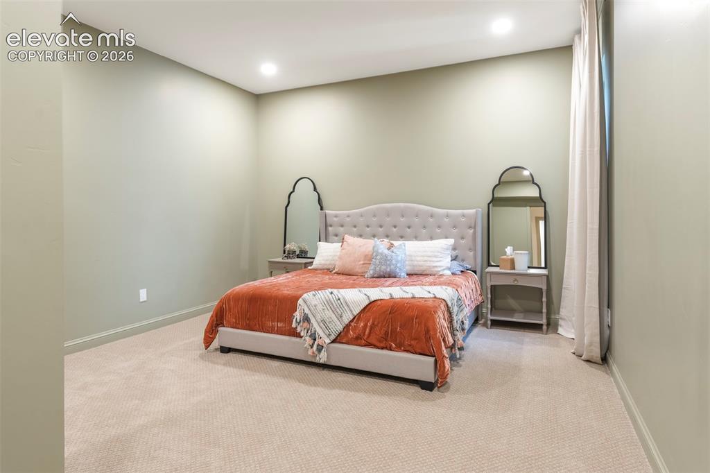 Image 42 of 49: Spacious third basement bedroom.