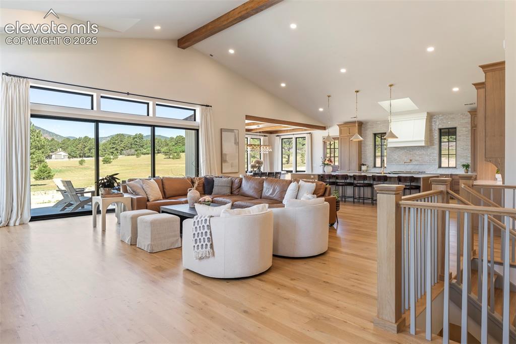Image 6 of 49: Designed to bring family and friends together beneath soaring vaulted ceili