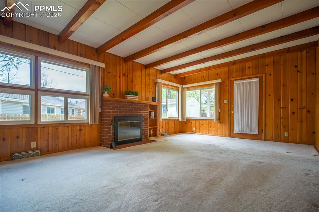 Image 18 of 28: Family/Bonus room has access to the backyard and patio