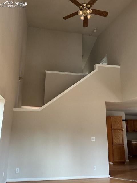Image 16 of 30: Staircase view from living area looking up 