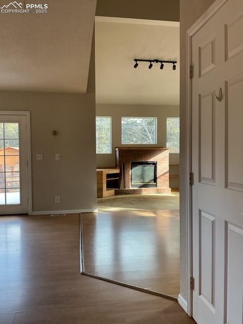 Image 18 of 30: View from hall looking into main living area