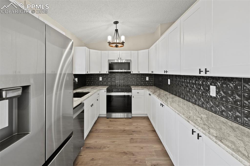 Image 12 of 38: Kitchen