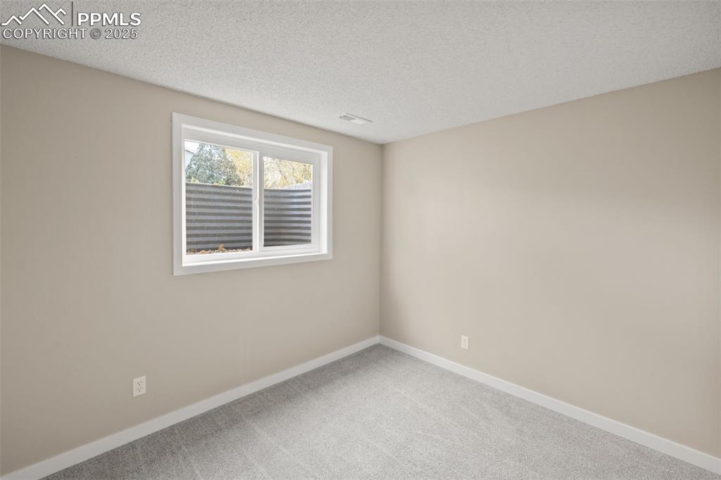 Image 26 of 38: Bedroom