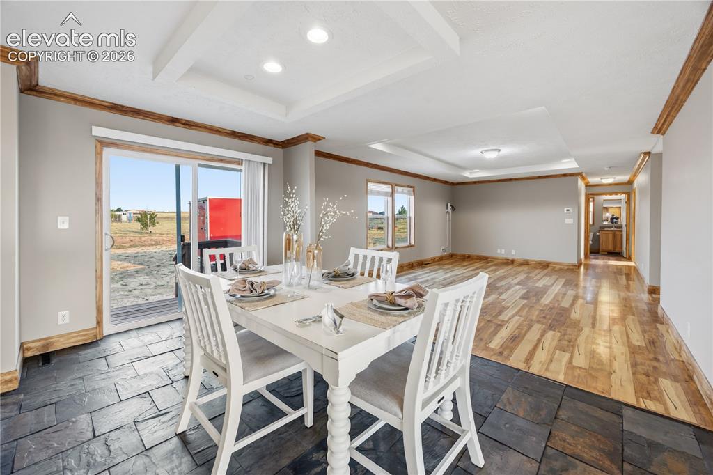 Image 16 of 49: Walk-Out to back yard from the dining area