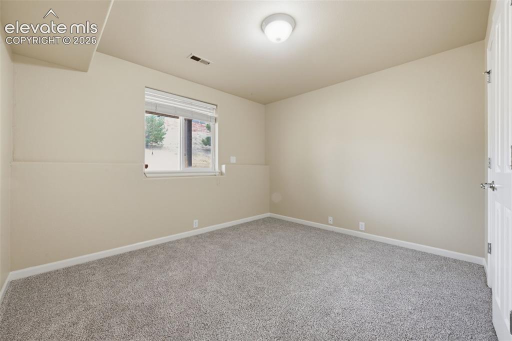 Image 20 of 23: Bedroom #4 in basement or use as an office