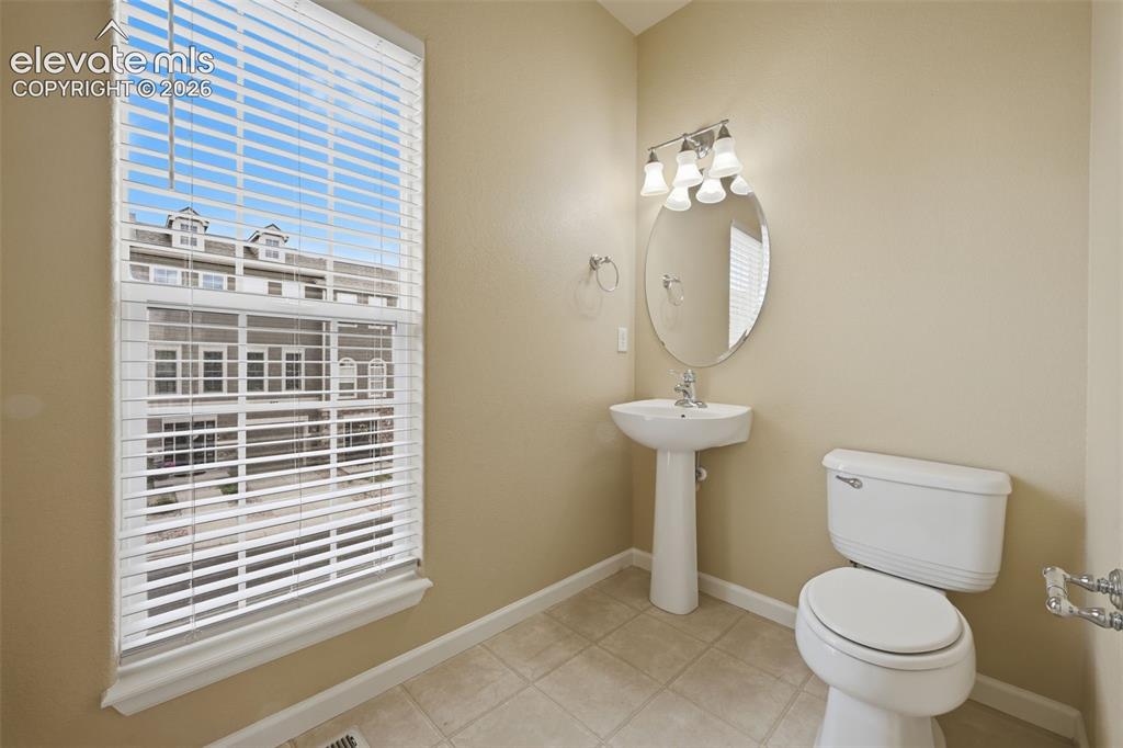 Image 9 of 23: 1/2 bath on the main level