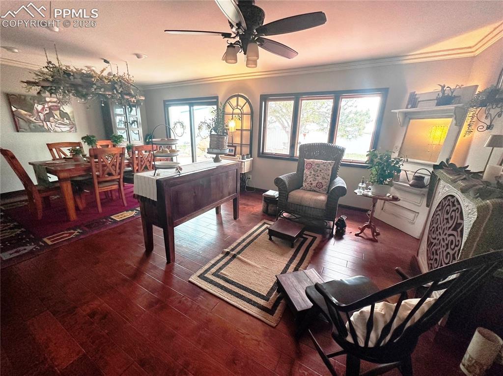 Image 19 of 48: Shows sitting and reading area adjacent to Dining table and patio door.