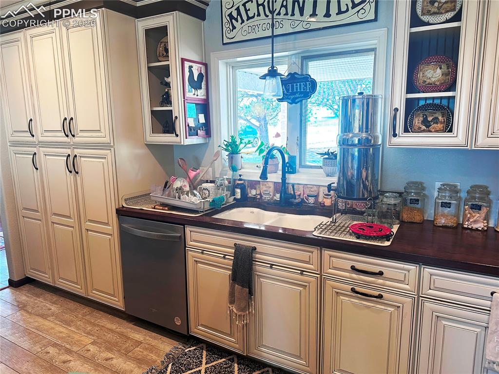 Image 20 of 48: Wonderful deep cabinets with rolling shelves.