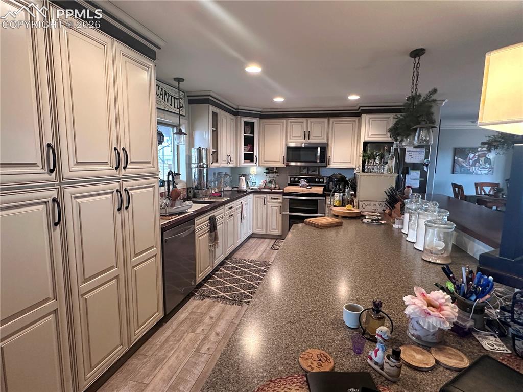 Image 23 of 48: Lengthwise view of kitchen.