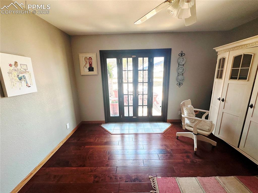 Image 36 of 48: Bedroom 2, or office next to Primary bedroom. It has its own access door. C