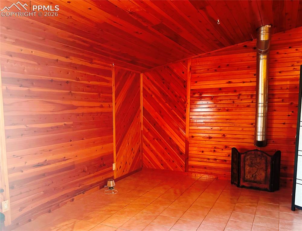 Image 45 of 48: Additional seating or dance floor.
