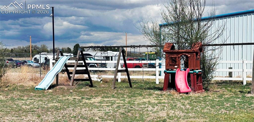 Image 8 of 48: Play structures in yard