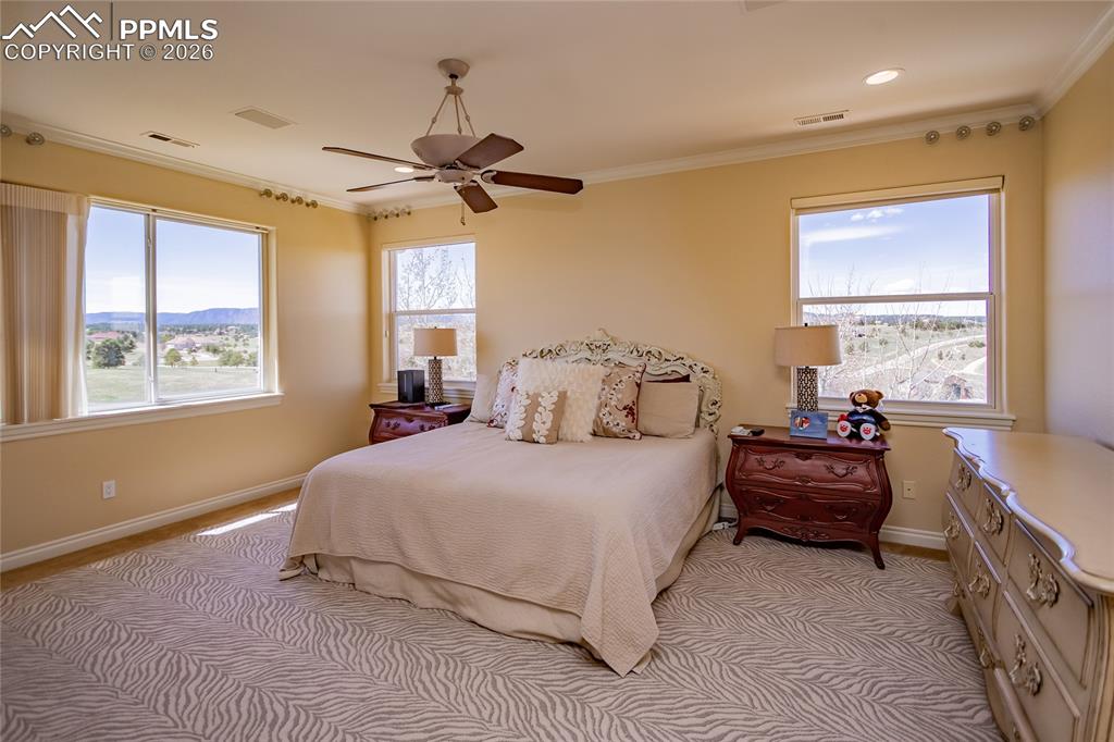 Image 21 of 50: Master Bedroom