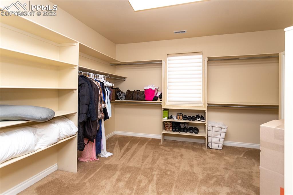 Image 24 of 50: Walk-In Closets