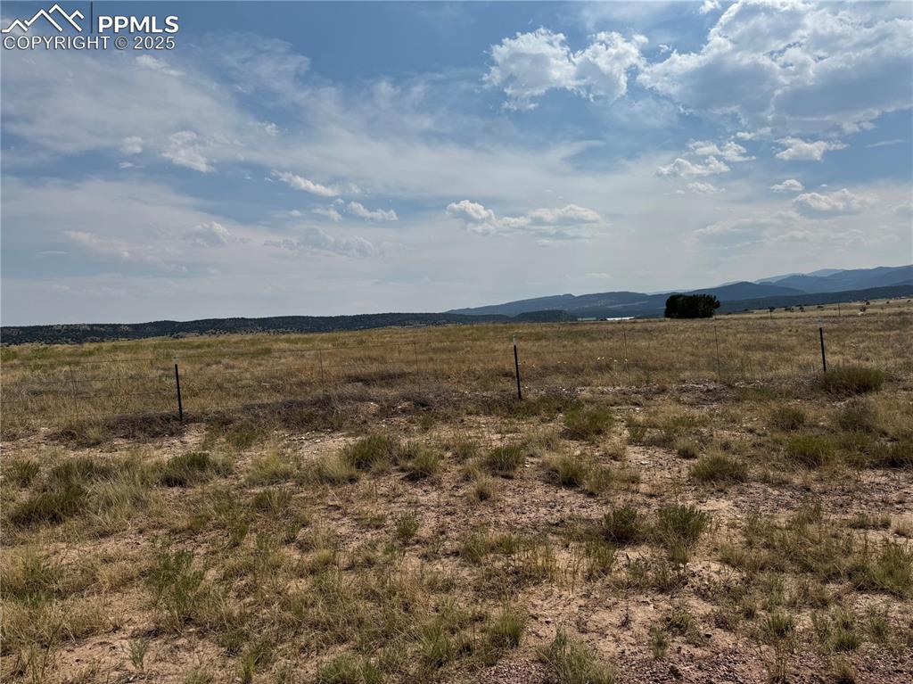Image 10 of 17: View of mountain background with rural landscape