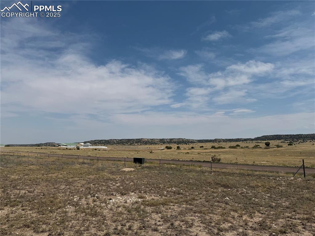 Image 17 of 17: View of yard with a view of countryside