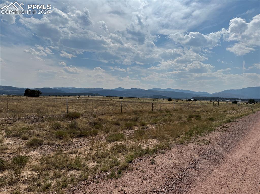 Image 8 of 17: View of mountain background featuring rural landscape