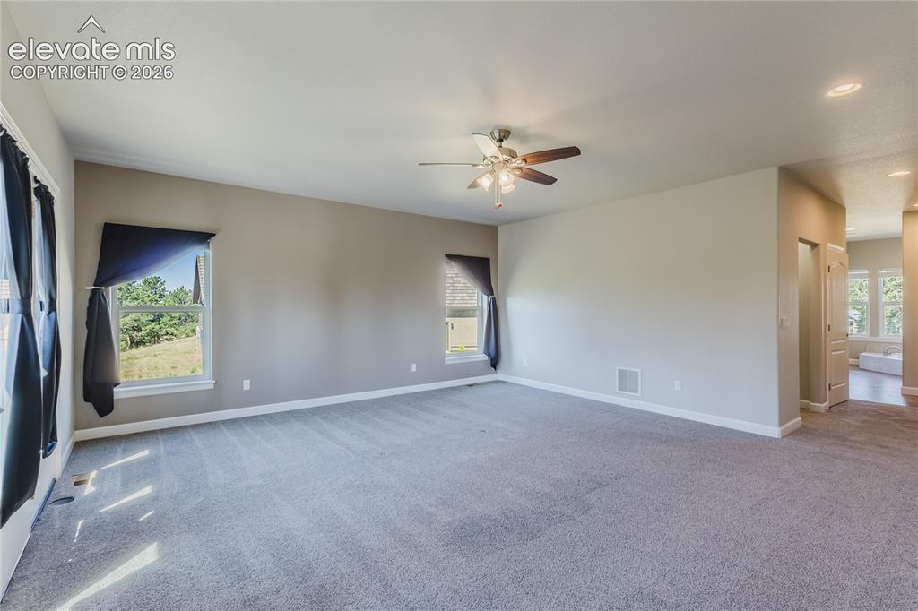 Image 20 of 50: Master Bedroom