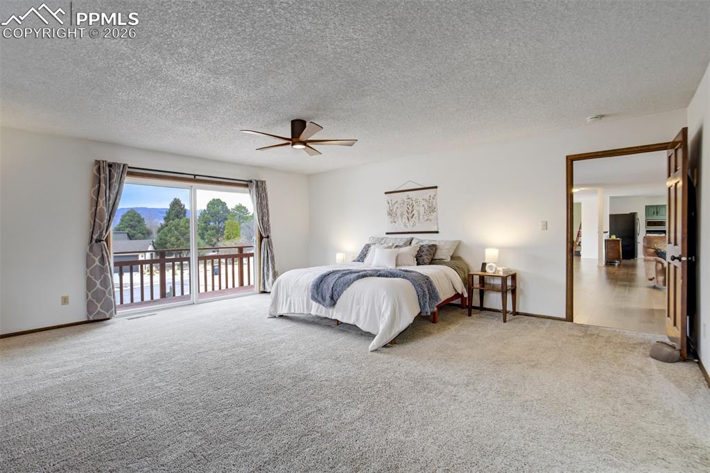 Image 12 of 50: Private Balcony off Primary Suite - Views Included!