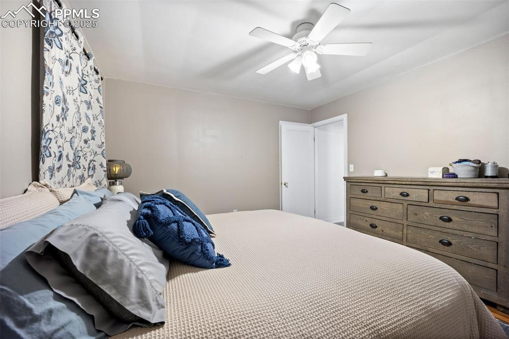 Image 18 of 47: Bedroom featuring ceiling fan