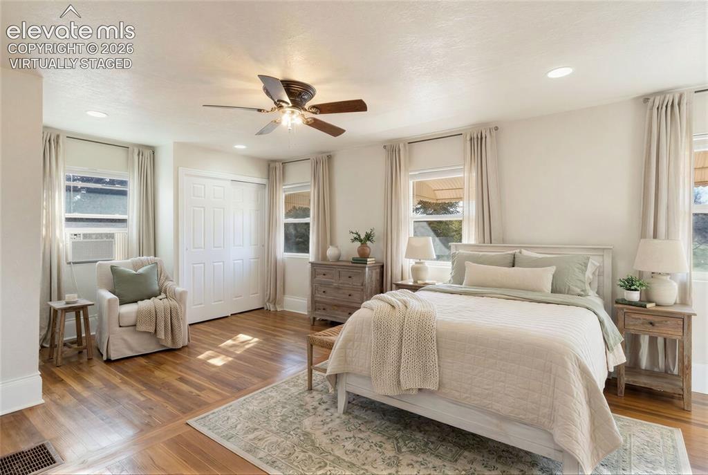 Image 31 of 42: Virtually Staged Hardwood-style flooring throughout