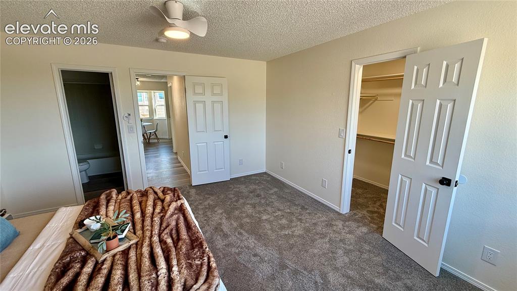 Image 10 of 22: walk-in closet and attached bath 