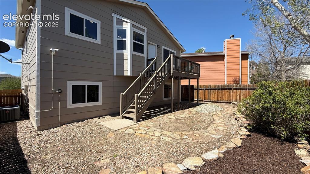 Image 14 of 22: wooden deck with stairs