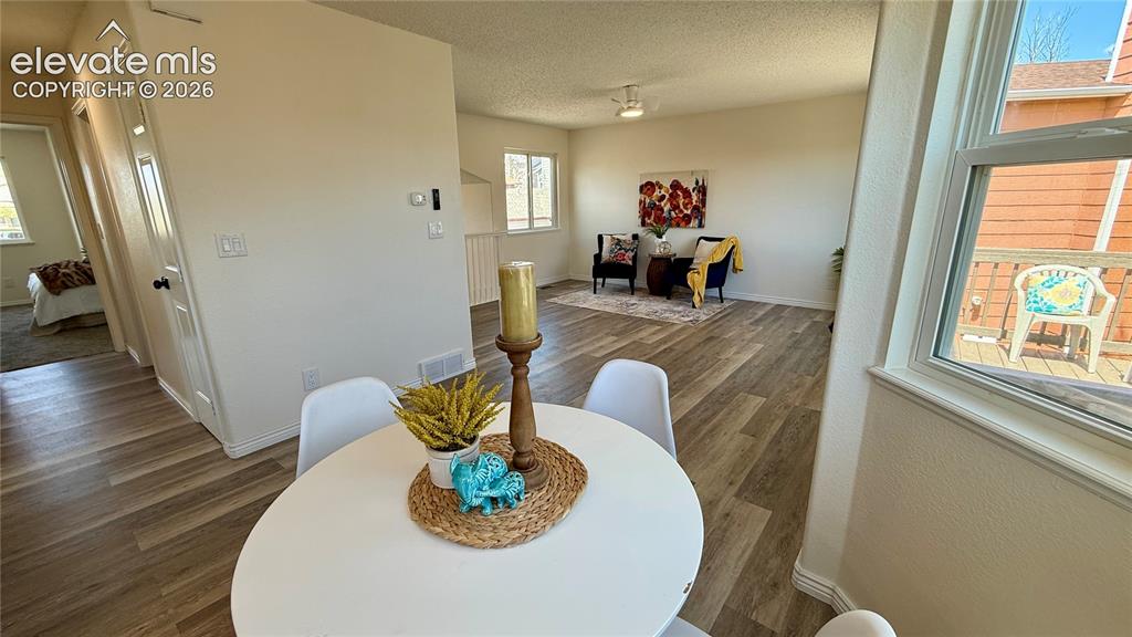 Image 6 of 22: dining area open to living room