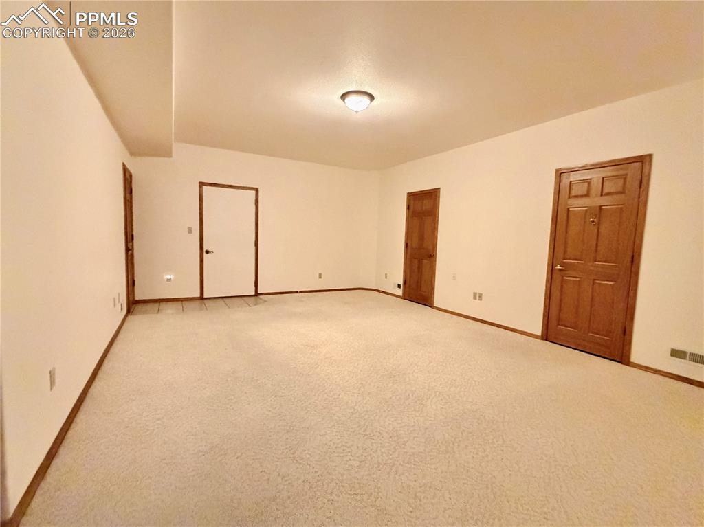 Image 28 of 45: Downstairs Family Room
