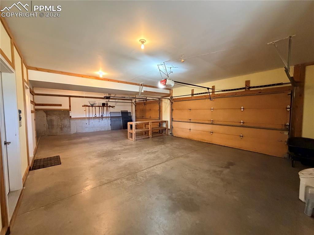 Image 33 of 45: Oversized 3 car garage