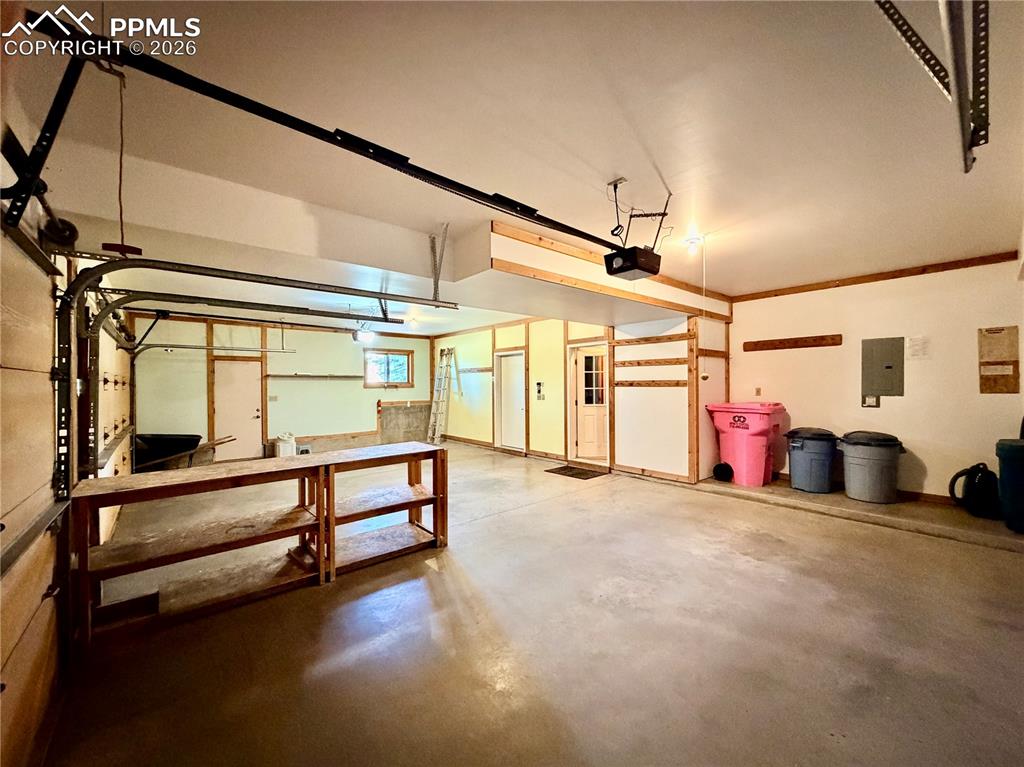 Image 34 of 45: Oversized 3 car garage