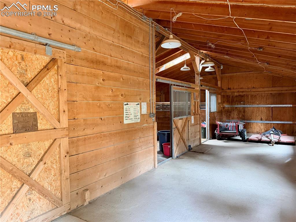 Image 39 of 45: View of horse barn