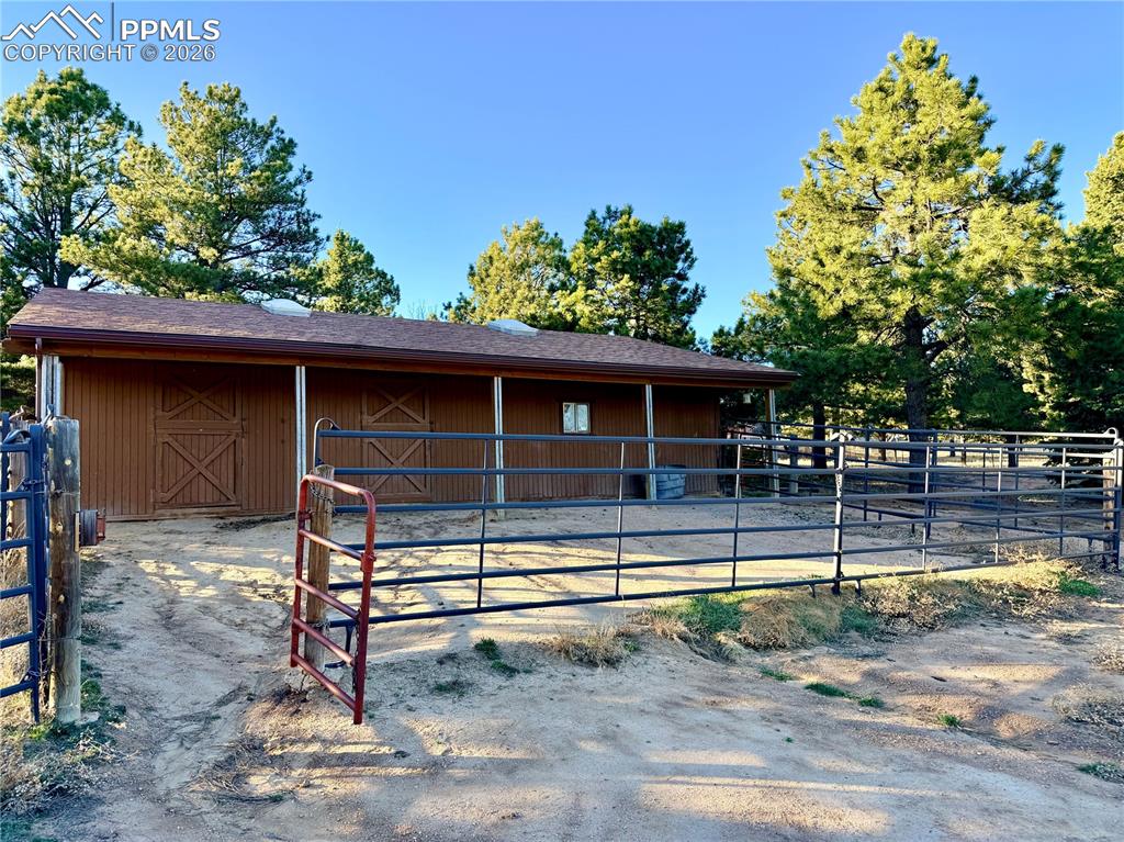 Image 9 of 45: View of horse barn