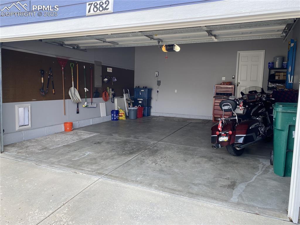 Image 29 of 41: With generous garage storage, there’s room for multiple cars, bikes, and ex