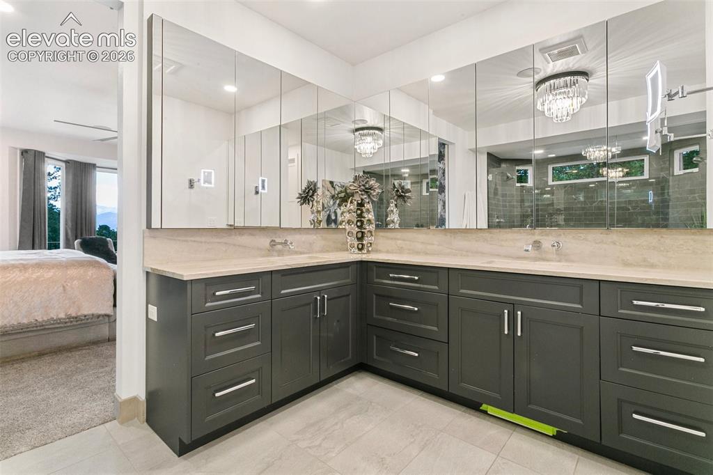 Image 20 of 49: Large double vanity with extensive storage you need to see in Person!
